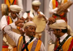 A Saudi Arabian traditional dance team performs during the
