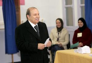 Algeria's President Abdelaziz Bouteflika prepares to cast his ballot