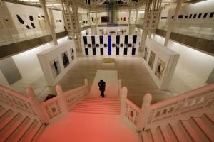 A woman stands in the new National Museum of