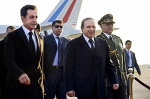 Algerian President Abdelaziz Bouteflika (2ndR) walks with his French