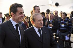 Algerian President Abdelaziz Bouteflika (2ndL) poses with his French