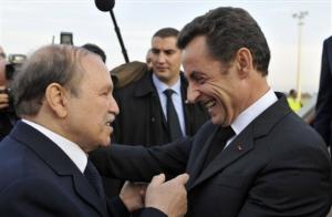 Algeria's President Abdelaziz Bouteflika, left, greets his French counterpart