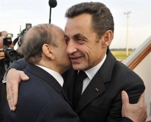 Algeria's President Abdelaziz Bouteflika, left, greets his French counterpart