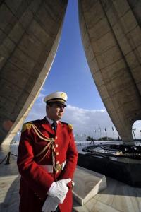 A soldier waits French President Nicolas Sarkozy at