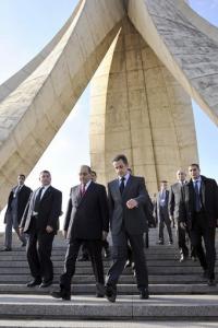 France's President Nicolas Sarkozy (2nd R) and Algerian Interior