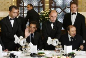 France's President Nicolas Sarkozy (L) and Algeria's President Abdelaziz