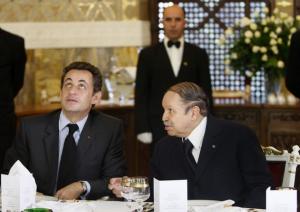 France's President Nicolas Sarkozy (L) and Algeria's President Abdelaziz