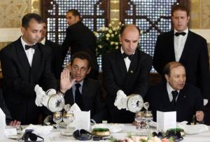 France's President Nicolas Sarkozy (L) and Algeria's President Abdelaziz