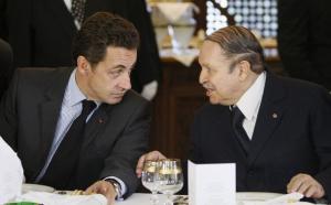 France's President Nicolas Sarkozy (L) and Algeria's President Abdelaziz