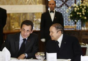 France's President Nicolas Sarkozy (L) and Algeria's President Abdelaziz