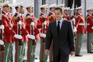 France's President Nicolas Sarkozy arrives at the Presidential Palace