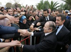 French President Nicolas Sarkozy, right, and Algeria's President Abdelaziz