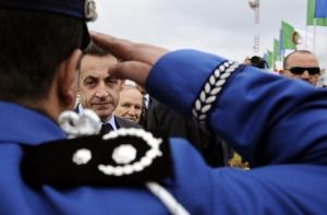 Algerian President Abdelaziz Bouteflika (C) and his French counterpart
