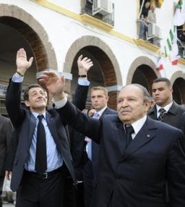 Algerian President Abdelaziz Bouteflika (R) and French President Nicolas