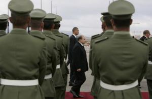 Algeria's President Abdelaziz Bouteflika walks on the red carpet