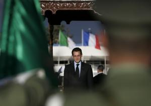 France's President Nicolas Sarkozy listens to the national anthem