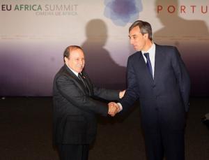 Algeria's President Abdelaziz Bouteflika (L) is greeted by secretary