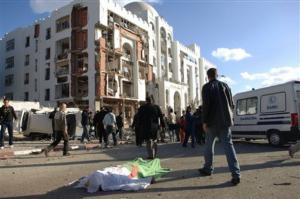 Rescuers work at the site of a bomb blast