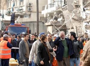 Rescuers tend to a victim at the site of