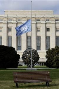 The UN flag flies at half-staff in front of