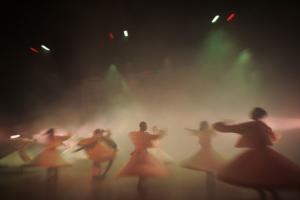 A Syrian traditional dance team performs during the inaugural