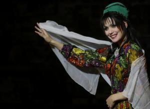 A Syrian model presents traditional dress during the inaugural