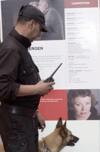 A Moroccan policement searches Marrakech's Palais des Congres 13