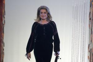 French actress Catherine Deneuve arrives on stage at the