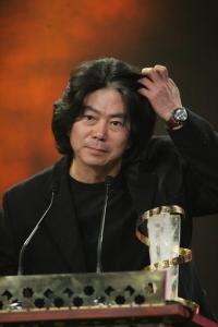 South Korean director Jeon Soo-il (L) stands beside the