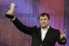 Russian film director Alexei Mizgirev holds the golden star