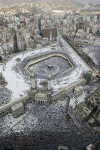 Muslims perform prayers around the holy Kaaba at the