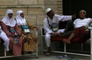 Muslims pilgrims relax  in Mecca, Saudi Arabia, Sunday,