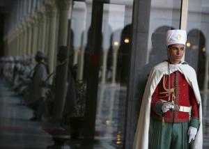 Algerian republican guards stand guard while Algeria's President Abdelaziz