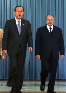 Algerian President Abdelaziz Bouteflika (R) escorts Secretary general of