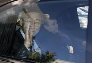 United Nation's Secretary General Ban Ki-moon waves to photographers