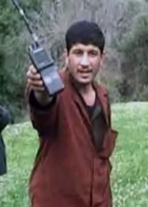 An undated file picture shows Abdel Moemen Rashid (C),