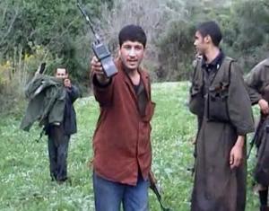 An undated file picture shows Abdel Moemen Rashid (C),