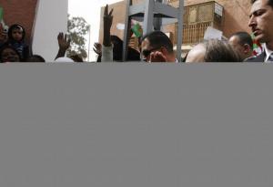 Algeria's President Abdelaziz Bouteflika waves to citizens during his