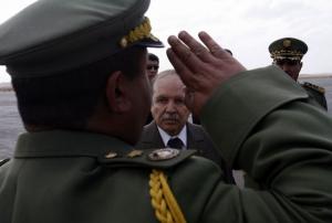 Algeria's President Abdelaziz Bouteflika is greeted by army officers