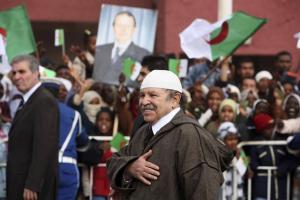 Algeria's President Abdelaziz Bouteflika smiles during his official visit