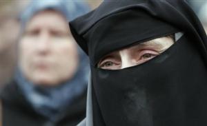 A Bosnian Muslim woman cries during a protest against