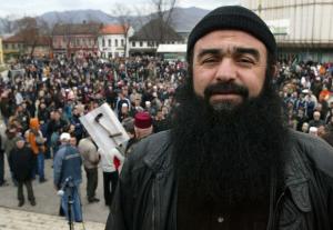 Syrian native Imad al-Husini, known as Abu Hamza, addresses