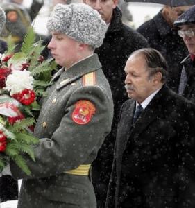 Algerian President Abdelaziz Bouteflika lays a wreath at the