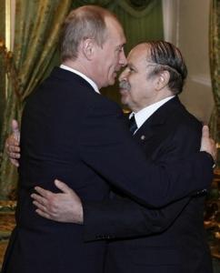 Russian President Vladimir Putin (L) welcomes Algerian President Abdelaziz