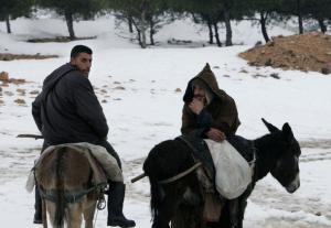 A picture taken March 07, 2008 shows two men