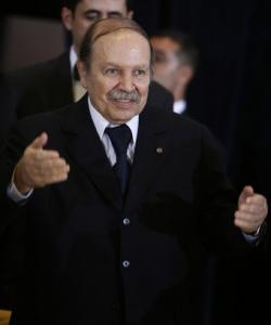 Algeria's President Abdelaziz Bouteflika welcomes guests during a lunch
