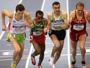 (L-R) Australia's Craig Mottram, Ethiopia's Tariku Bekele, Algeria's Kamal