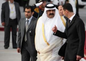 Syrian President Bashar al-Assad (R) receives Qatari Emir Sheikh
