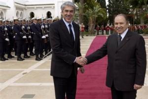 Algerian President Abdelaziz Bouteflika, right, greets Portugal's Prime Minister