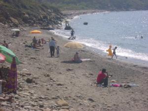 La plage de Tigzirt en Saison Estivale